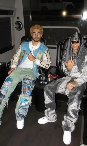 Riot wearing Who Decides War jeans