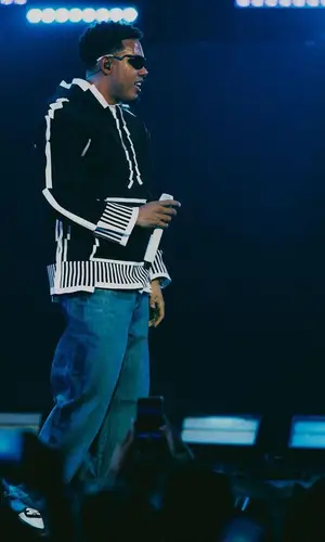 Myke Towers wearing Loewe hoody