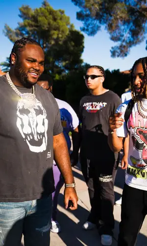 Tee Grizzley wearing Saint Michael t-shirt