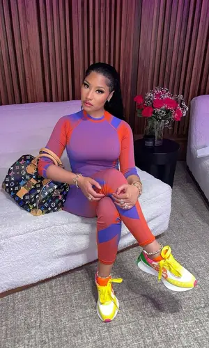 Nicki Minaj’s Outfit in Y-3 T-Shirt, Alexander McQueen Sneakers & Louis Vuitton Bag (2023)
