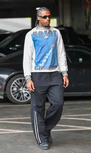 Tee Higgins wearing Prada eyewear