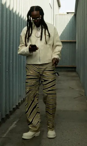2 Chainz wearing Bottega Veneta boots