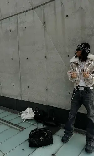 Lil Tecca wearing Alexander McQueen scarf