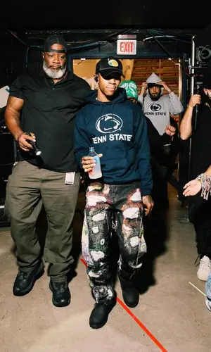 A Boogie Wit Da Hoodie wearing Chrome Hearts t-shirt