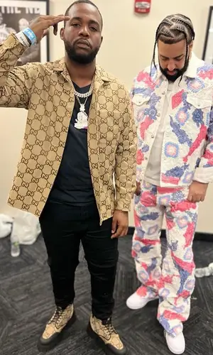Teejay wearing Gucci boots