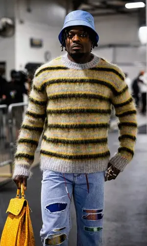 Marquise Goodwin wearing Marni sweater