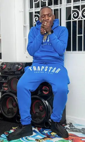 Valiant wearing Trapstar pants