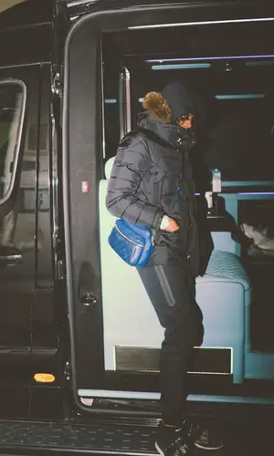 Russ Millions’ Outfit in Moncler Jacket, Nike Pants & Louis Vuitton Bag (2023)