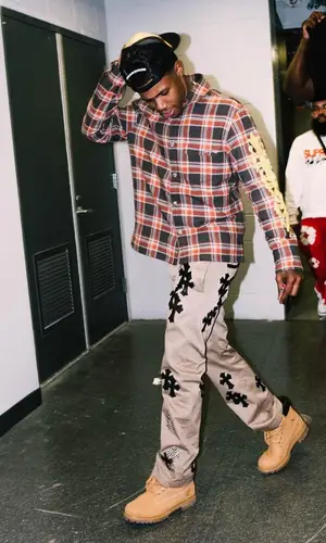 A Boogie Wit Da Hoodie wearing Timberland boots