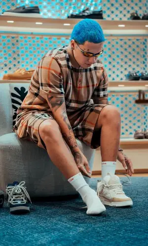 Blessd wearing Louis Vuitton sneakers