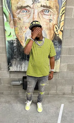 Baby Money wearing Amiri jeans
