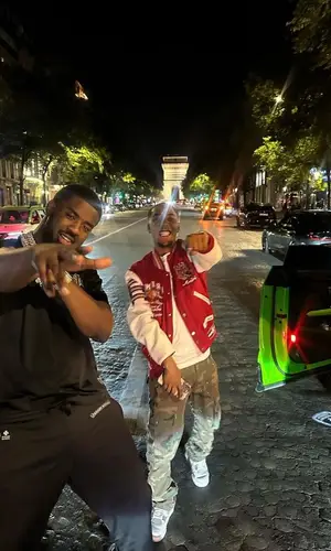 Tion Wayne wearing Chrome Hearts pants