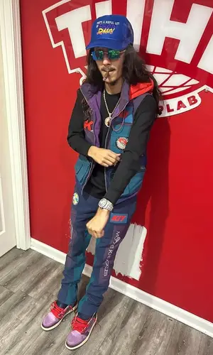 BabyTron wearing Moose Knuckles pants