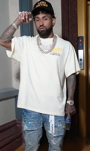 Bryant Mayers’ Outfit in Purple Brand Jeans & Gallery Dept. Cap (2023)