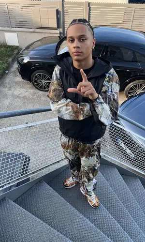 Fave wearing Nike sneakers