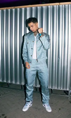 Veigh wearing Versace jacket
