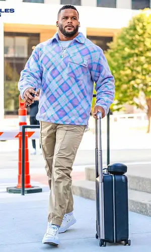 Aaron Donald wearing Dior sweatshirt