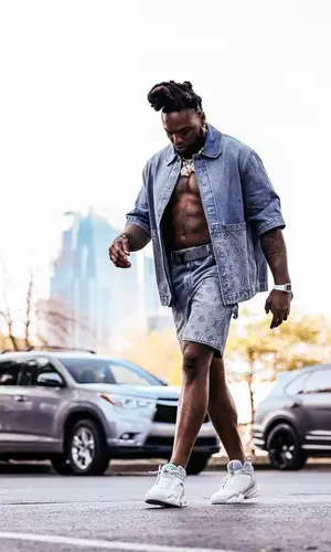 Derrick Henry wearing Louis Vuitton sneakers