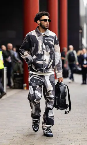 Drake London wearing Louis Vuitton pants