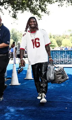 CeeDee Lamb wearing Celine t-shirt