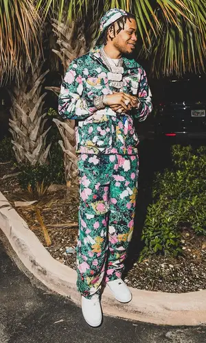 Lil Migo wearing Supreme pants