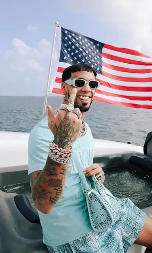 Anuel AA wearing Amiri t-shirt