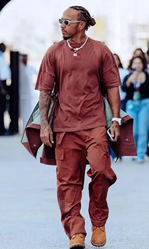 Lewis Hamilton’s Outfit in Tommy Hilfiger T-Shirt, Timberland Boots & Gentle Monster Eyewear (2023)