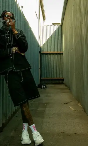 2 Chainz wearing Prada shirt