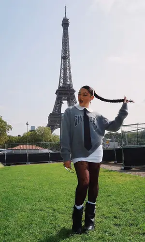 Avani Gregg wearing Givenchy boots