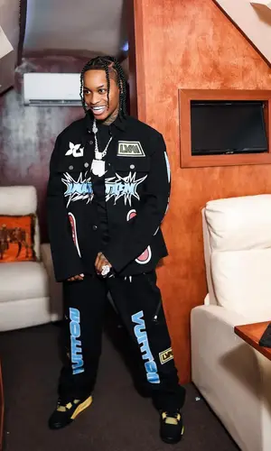 Lil Perfect’s Outfit in Louis Vuitton Jacket & Jordan Sneakers (2023)
