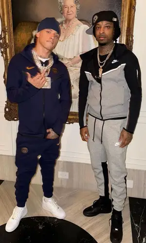 21 Savage wearing Nike pants