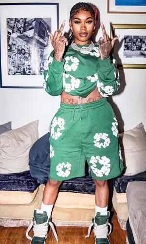 Asian Doll wearing Denim Tears hoody