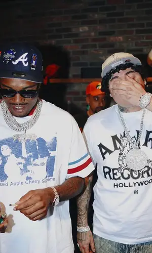OhGeesy’s Outfit in Amiri T-Shirt & New Era Cap (2023)