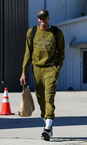 Giannis Antetokounmpo wearing Nike sweatshirt