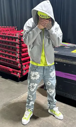 Central Cee wearing Denim Tears jeans