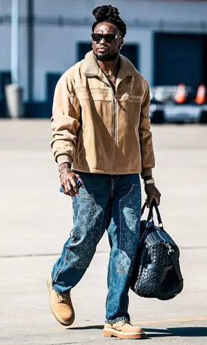 Derrick Henry wearing Louis Vuitton jacket