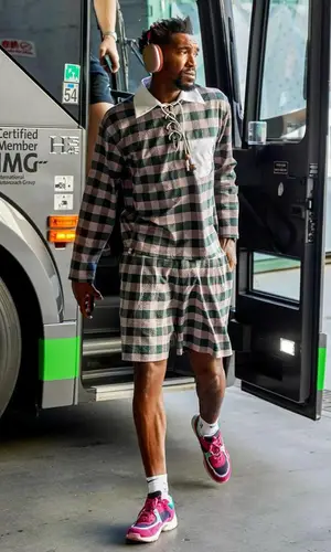 Malik Ahmad Monk wearing Chanel sneakers