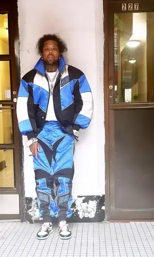 Westside Gunn’s Outfit in Gucci Jacket, Travis Scott Merch Sneakers & Fragment Design (2023)