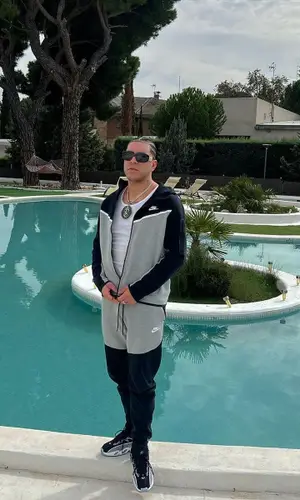 Ryan Castro’s Outfit in Nike Jacket, Nocta Sneakers & Versace Eyewear (2023)