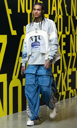 Jordan Clarkson wearing Who Decides War sweater