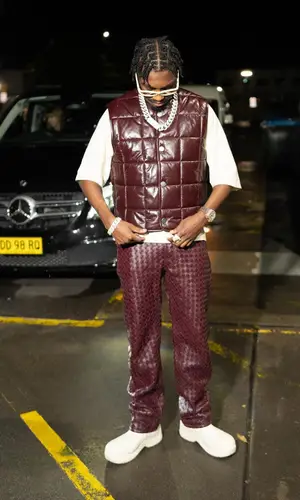 Lil Tjay wearing Bottega Veneta boots
