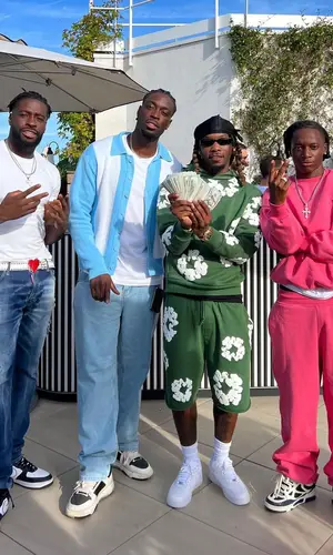 Offset wearing Denim Tears shorts