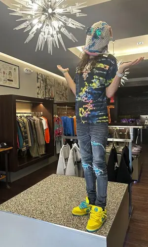 BabyTron wearing Louis Vuitton t-shirt