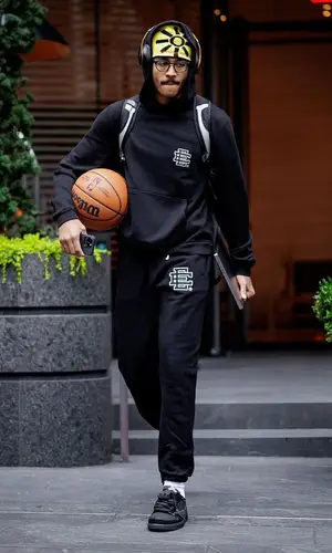 Jordan Poole wearing Spencer Badu hat