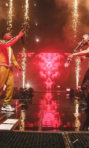 Timal wearing Lacoste pants