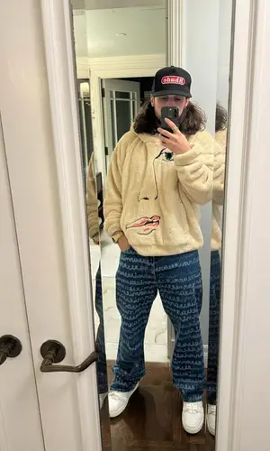 Russ’ Outfit in KidSuper Jacket, Marni Jeans & Rhude Cap (2023)
