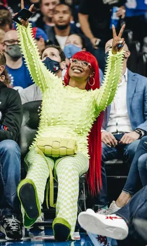 Tierra Whack wearing Bottega Veneta bag