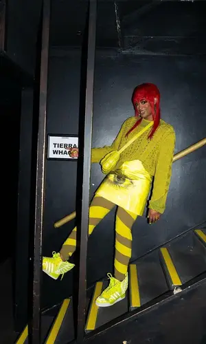 Tierra Whack wearing Adidas sneakers