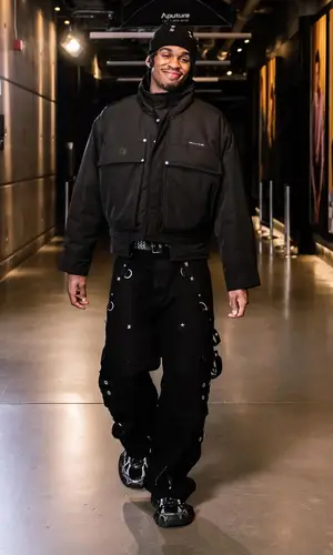 Joshua Christopher’s Outfit in 1017 Alyx 9SM Jacket, Balenciaga Jeans & Rick Owens Hat (2023)