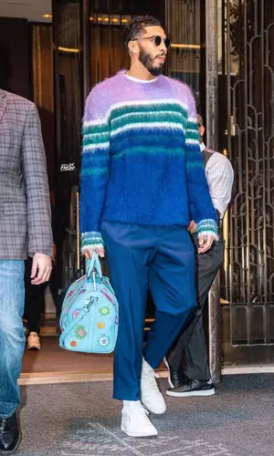 Jayson Tatum wearing Louis Vuitton bag